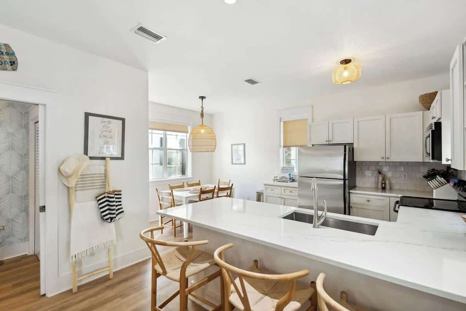 Large kitchen island includes seating for 3.