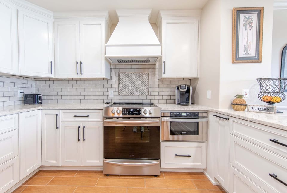 Fully applianced kitchen with stainless appliances, coffee essentials, and all the cooking essentials to elevate your stay