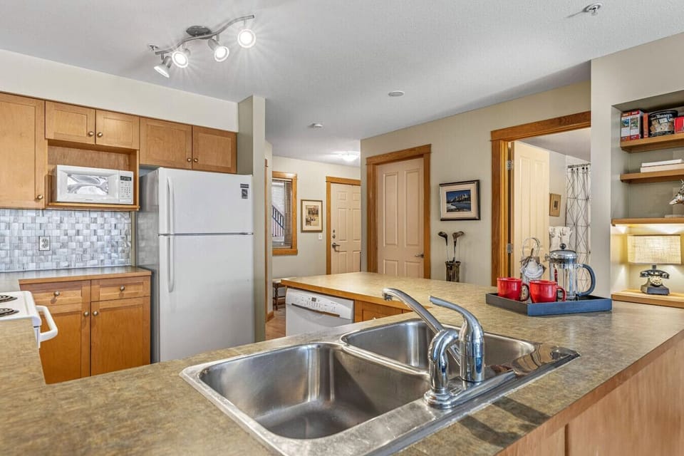 The kitchen boasts lots of counter space to prepare your favorite meals.