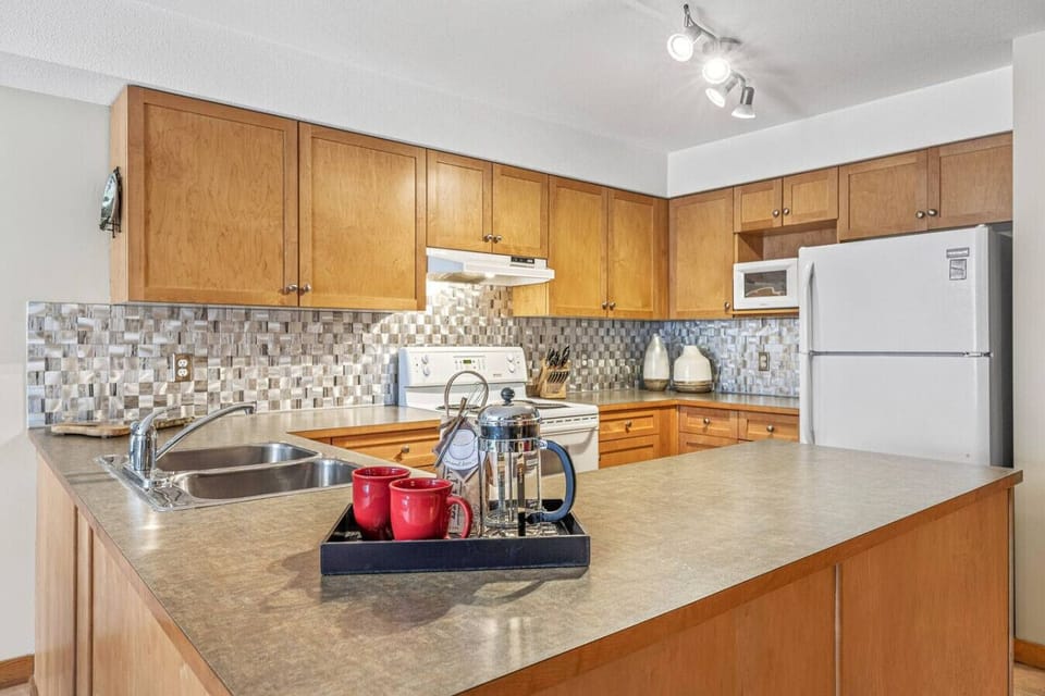 The kitchen boasts lots of counter space to prepare your favorite meals.