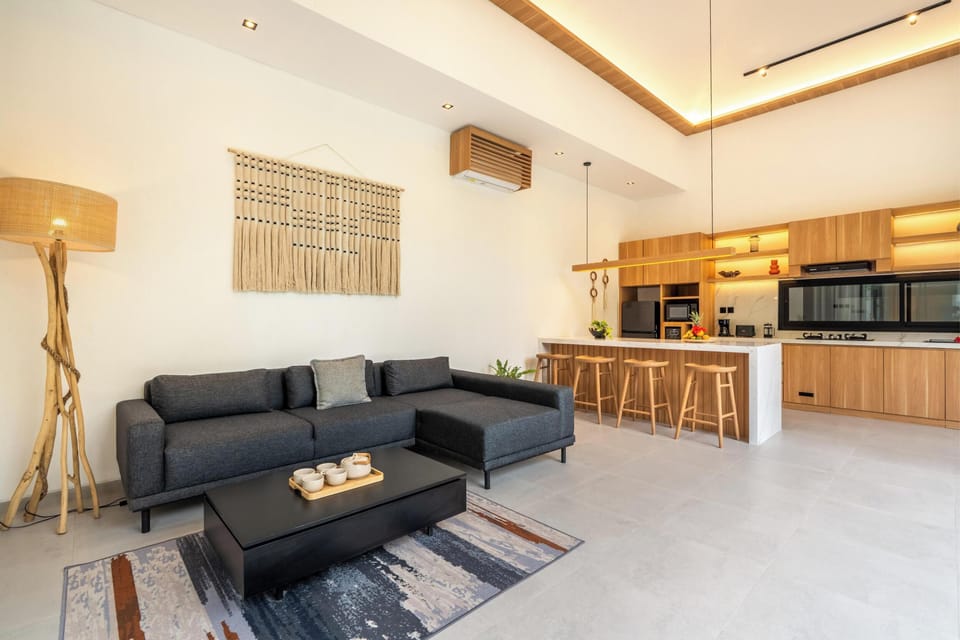 Deluxe Villa, Garden View | Living area | Flat-screen TV