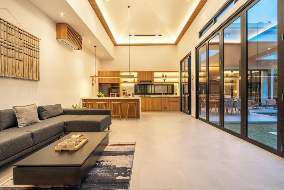 Deluxe Villa, Garden View | Living area | Flat-screen TV