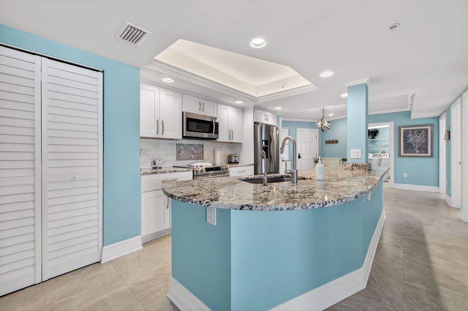 Full kitchen with stainless steel appliances