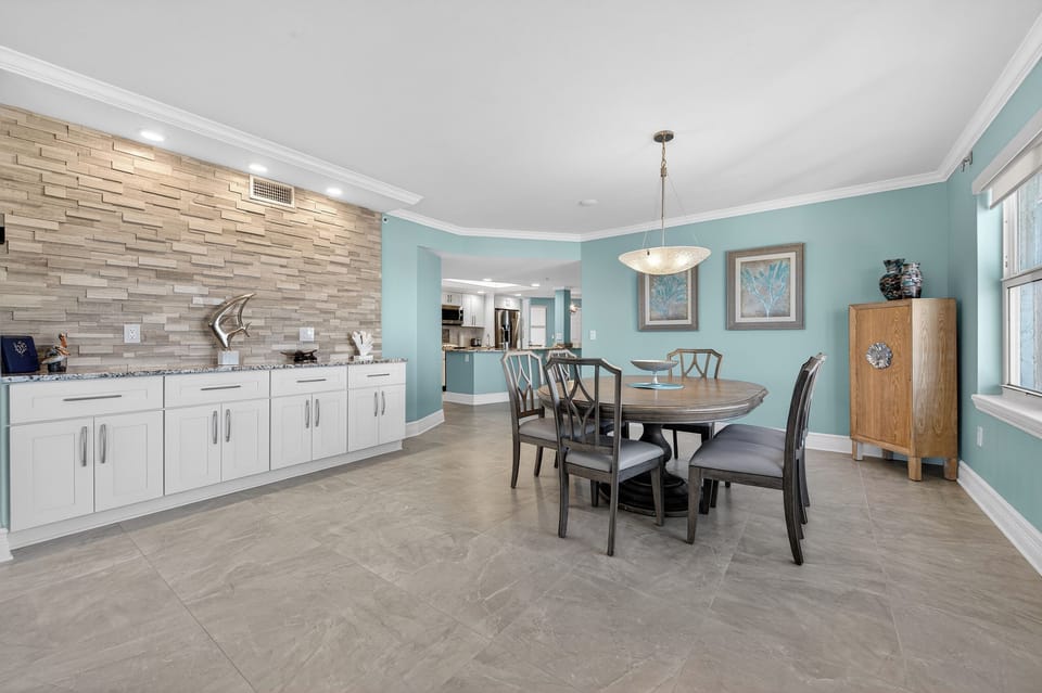 Large dining table and buffet counter space