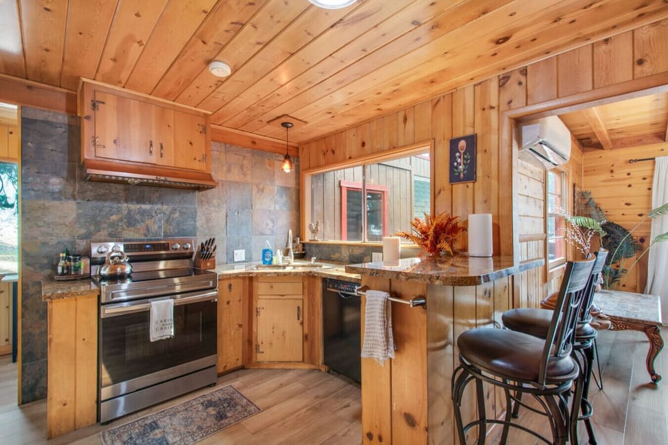 Spacious kitchen with plenty of counter space for meal prep.