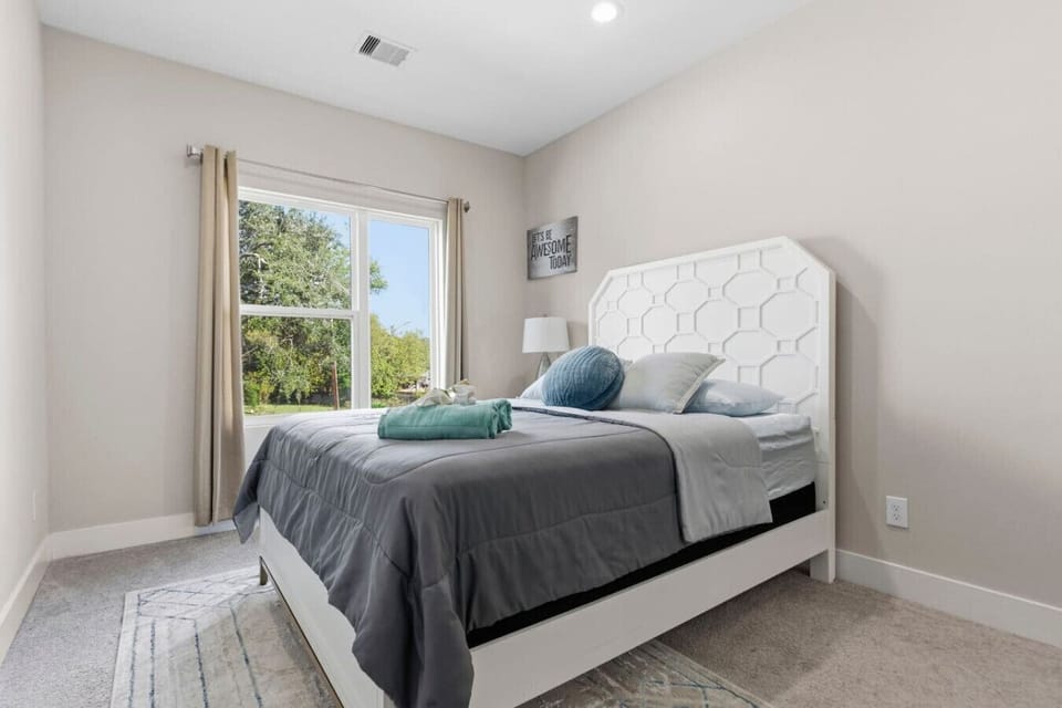A beautifully designed bedroom for a relaxing stay.