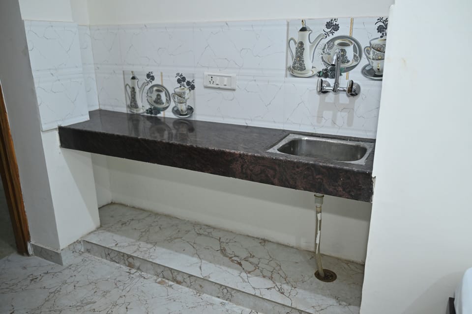 Executive Room | Bathroom | Shower, towels, soap, shampoo