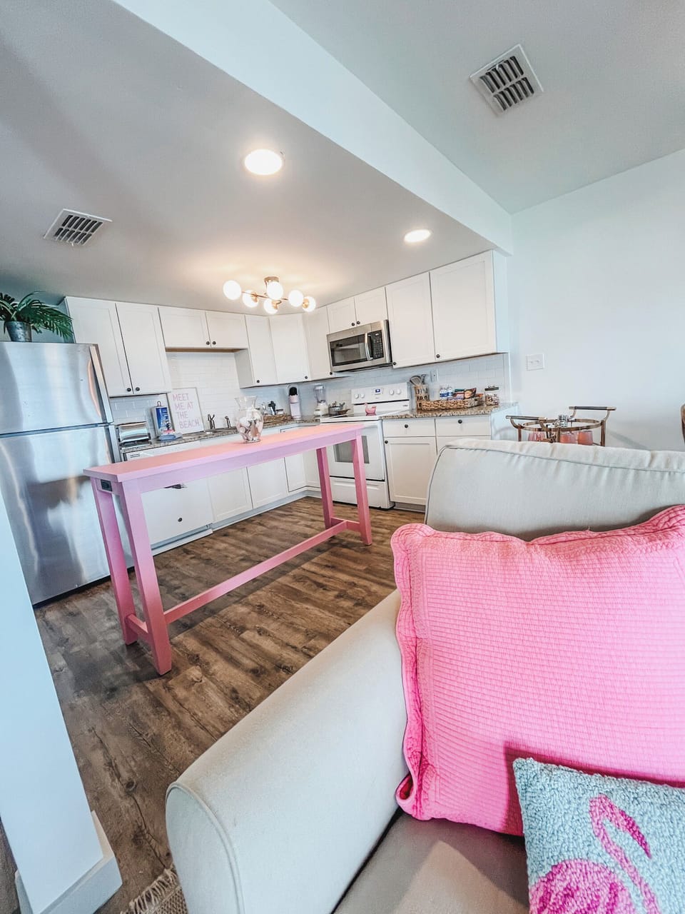 Check out all of the flamingo pink touches within the condo!