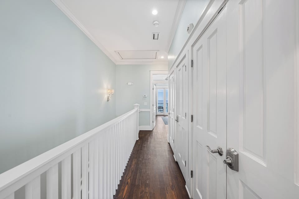 Third Floor Hallway between the primary King Bedroom and the Guest king Bedroom.