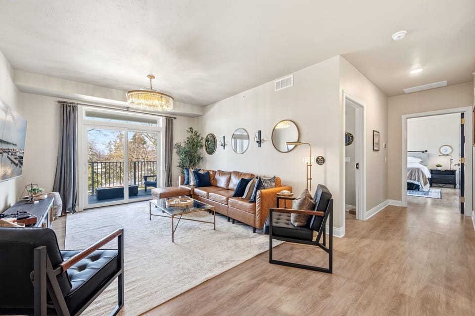 Light-filled living room with stylish seating and easy access to the wraparound veranda.