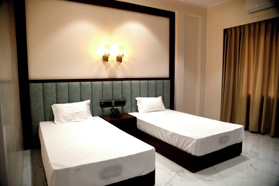Deluxe Double Room, City View | Desk, laptop workspace, free WiFi