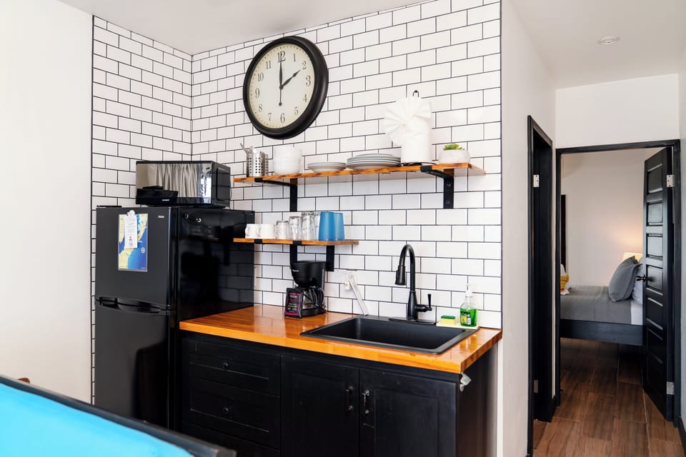 Kitchenette w/refrigerator, coffee maker, sink, hot plate