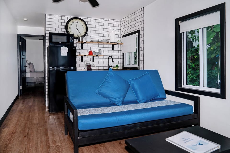 Settle into your cozy living space featuring a sofa (full size futon)— a perfect retreat for your stay.