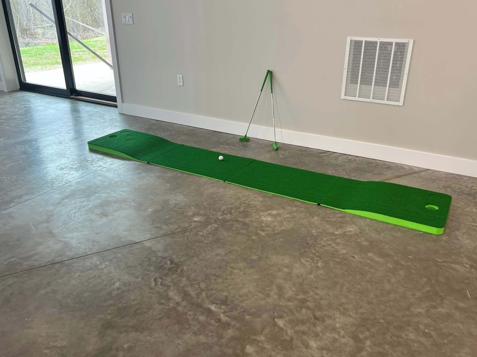 Lower-level heated floors putt-putt