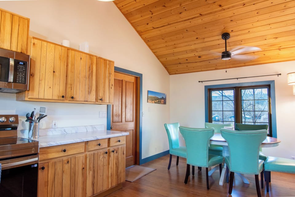 Dining area ideal for family meals, games, or planning the next day’s adventures