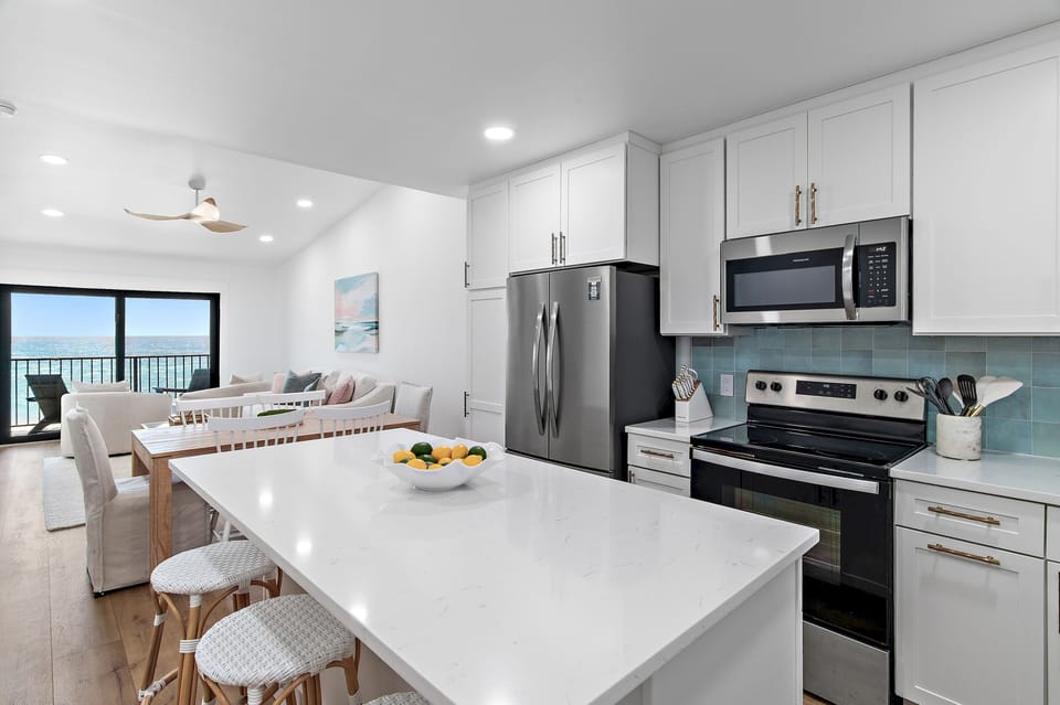 This beautifully renovated kitchen features modern finishes, updated appliances, and everything you need to prepare meals during your stay.