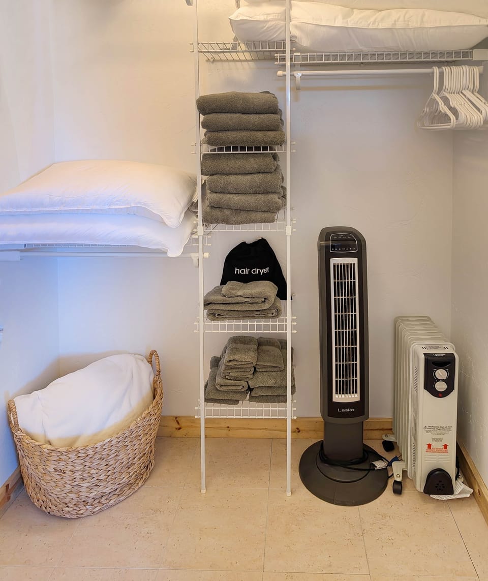 Master Closet with Tower Fan, Heater, Blanket, Hair Dryer, etc