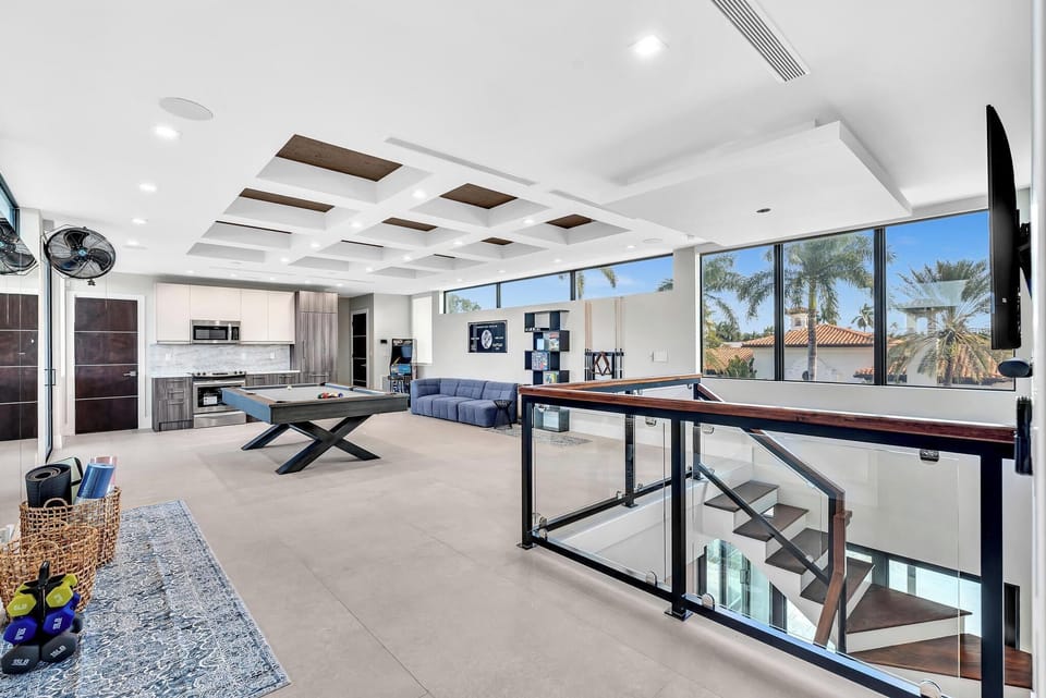 A refined secondary kitchen within the club lounge, offering convenience and style for entertaining in comfort.
