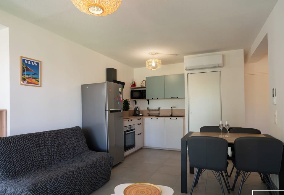 Large air-conditioned living room opening onto the terrace