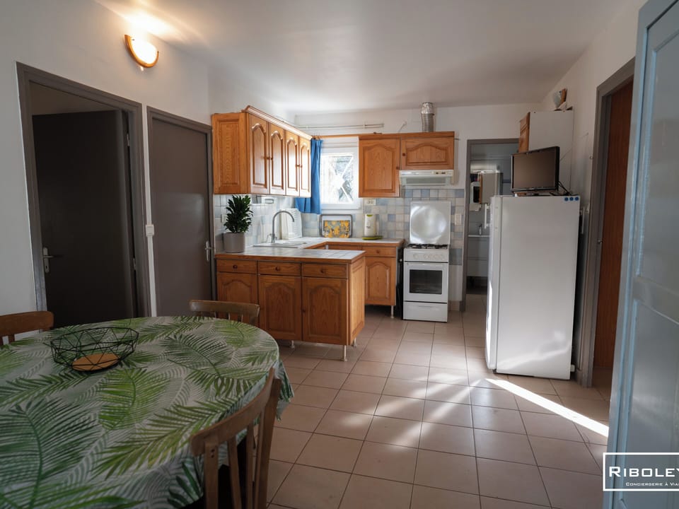 Living room with open-plan kitchen