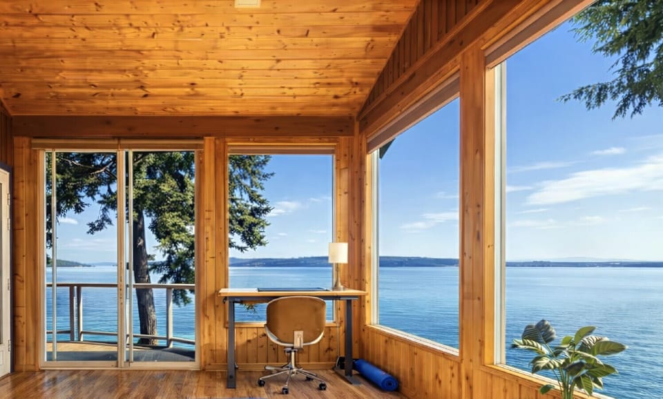 Sun Room: Panoramic water view and high speed wifi make for the perfect work escape!
