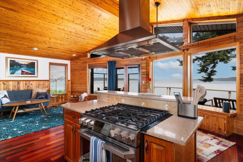 Living Room: Bright and airy space with stunning views, perfect for relaxation and gatherings!