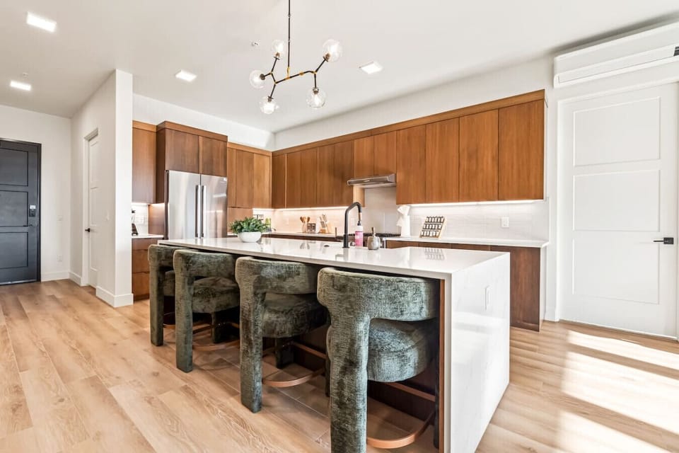 marble countertop with 4 stools