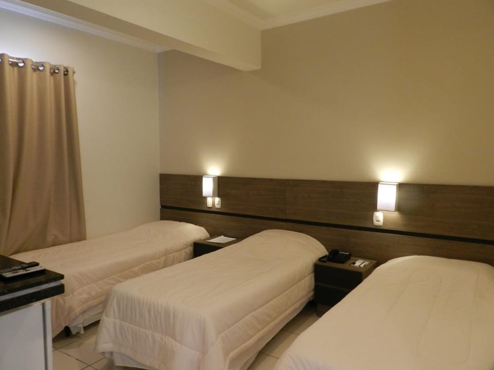 Minibar, blackout drapes, iron/ironing board, free WiFi