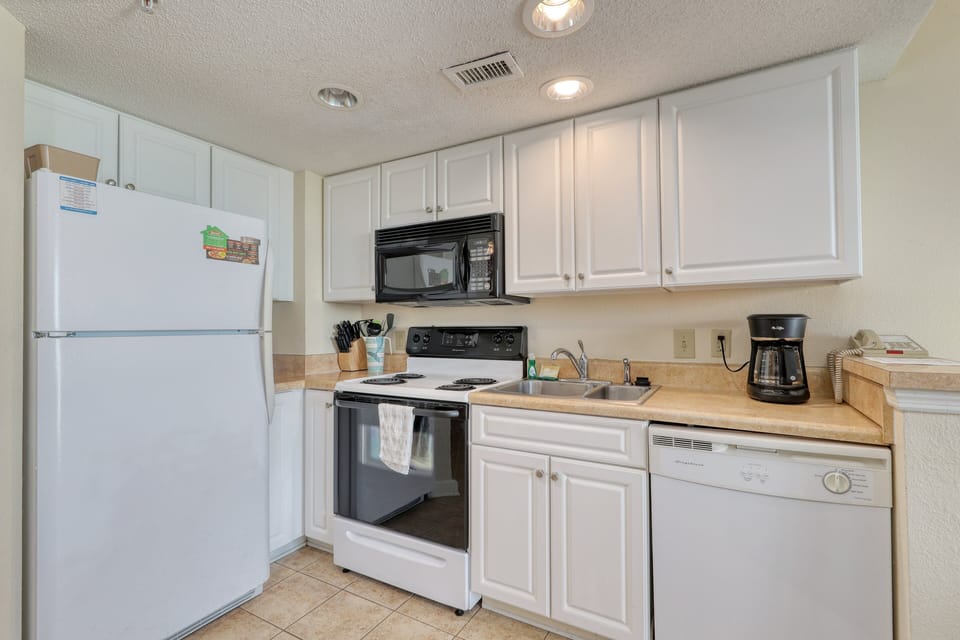 Kitchen - Stove, Fridge, Microwave and Dishwasher