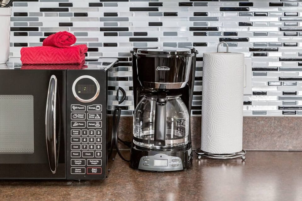 Microwave and coffee maker.