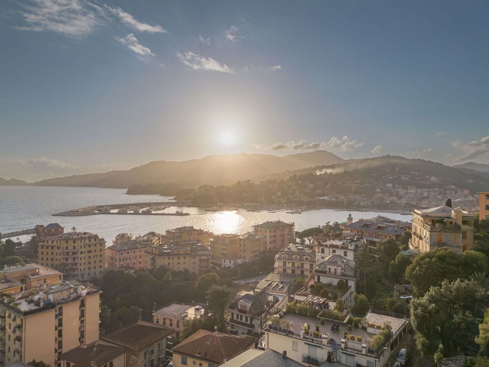Mountainous Landforms, Horizon, City, Hill, Landscape, Mountain, Residential Area, Dusk, Human Settlement, Coastal And Oceanic Landforms