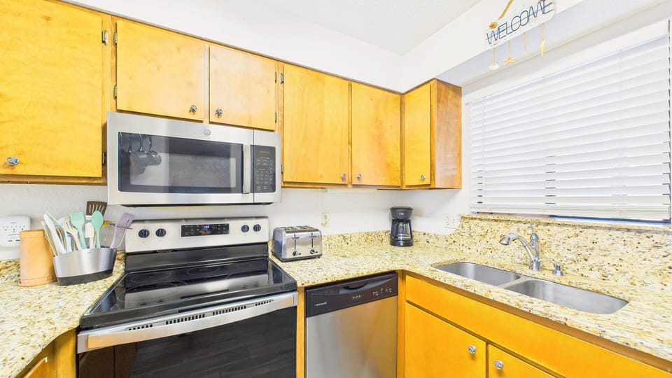 Full kitchen with updated appliances and all cooking essentials for your culinary desires
