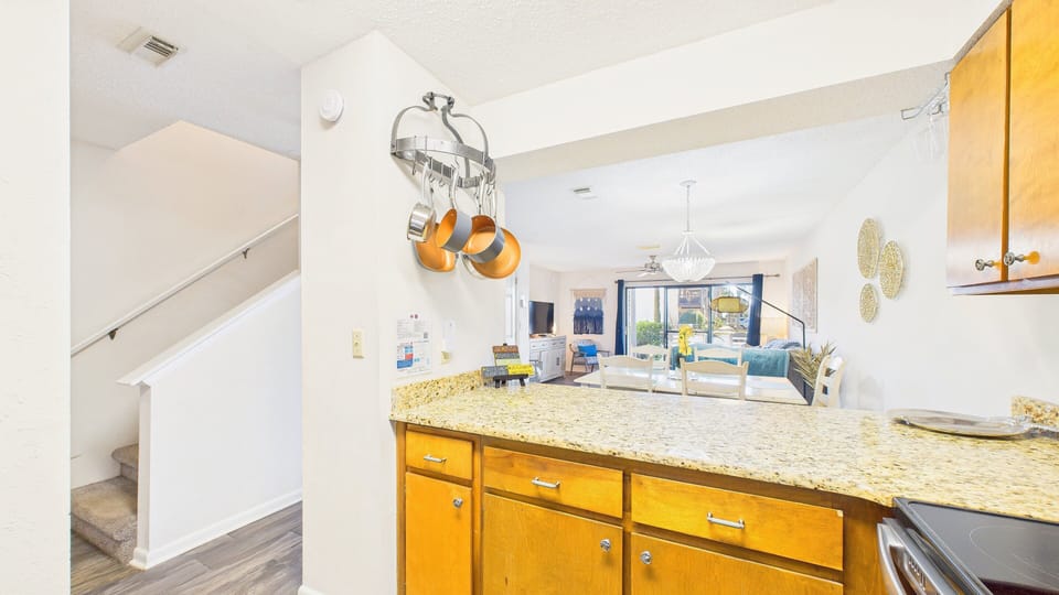 Kitchen counter with breakfast bar seating perfect for early mornings