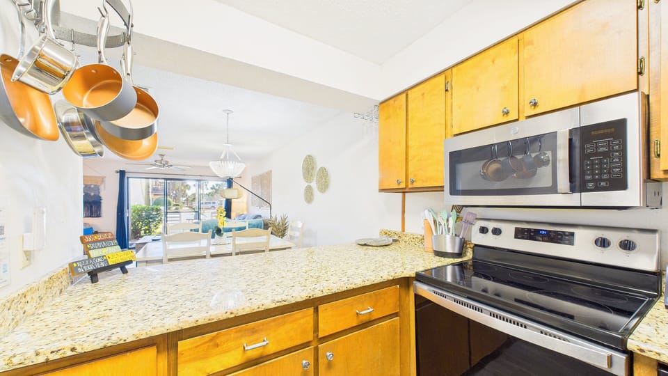 Kitchen counter with breakfast bar seating perfect for early mornings
