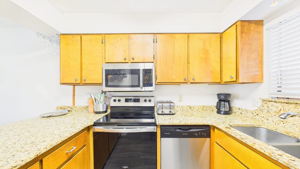 Full kitchen with updated appliances and all cooking essentials for your culinary desires