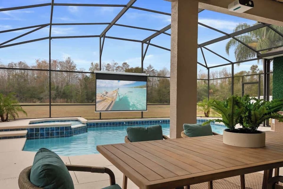 Enjoy movies, meals, and memories by the pool. This unique setup lets you swim, lounge, and watch your favorite shows, turning every pool day into an unforgettable shared experience.