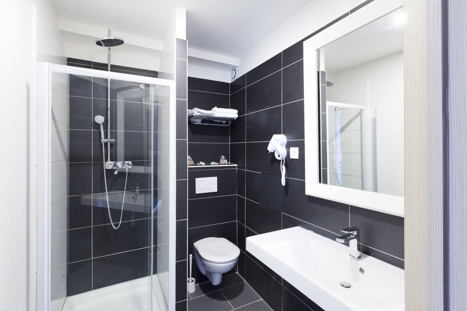 Shower, free toiletries, hair dryer, towels