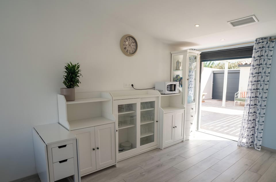 Kitchen opening onto the living area
