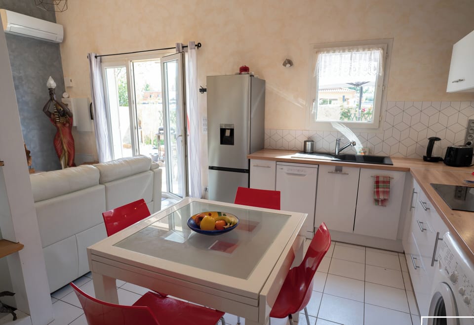 Fully-equipped kitchen with washing machine, dishwasher...