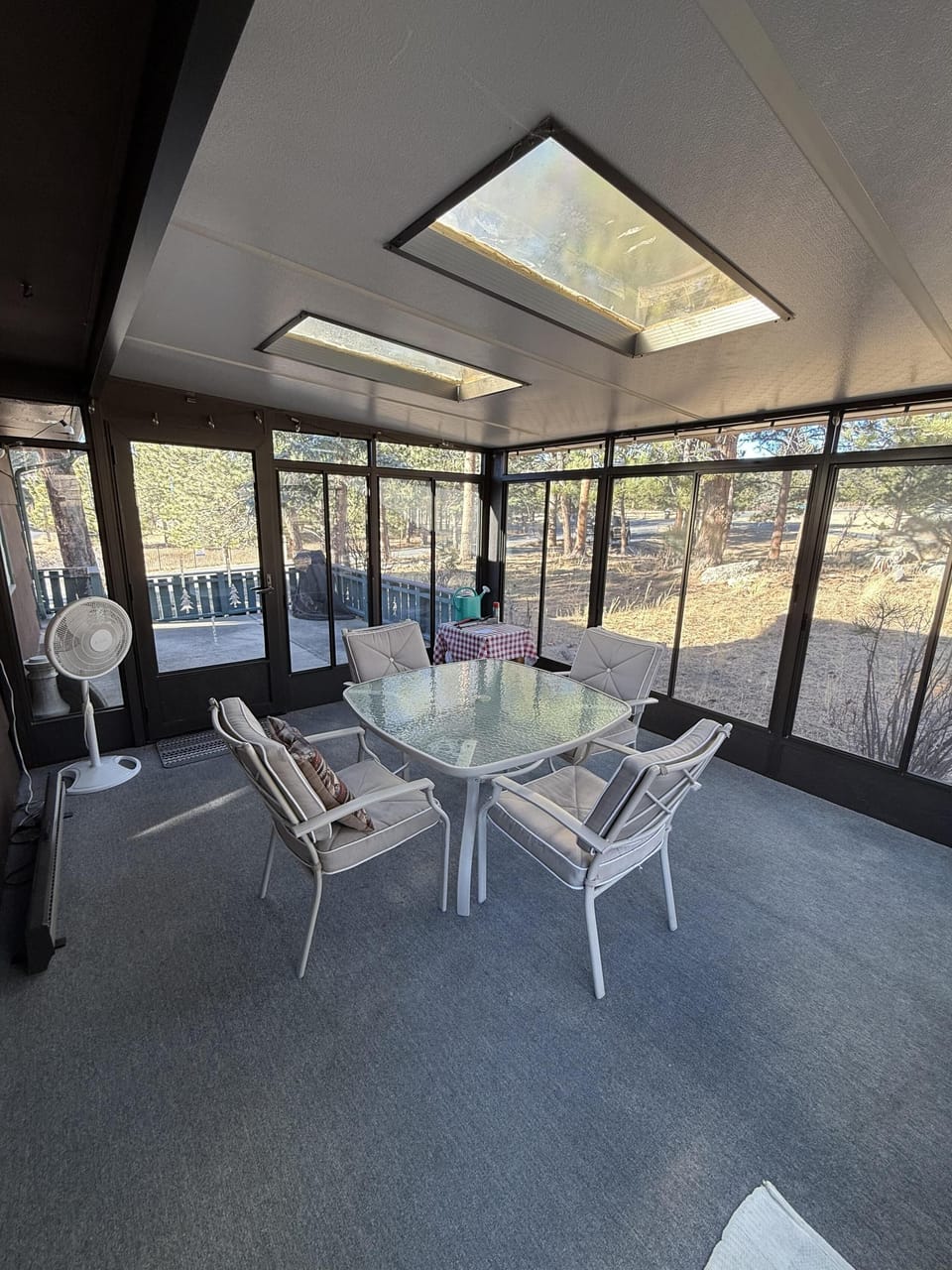Sunroom dining with natural light
