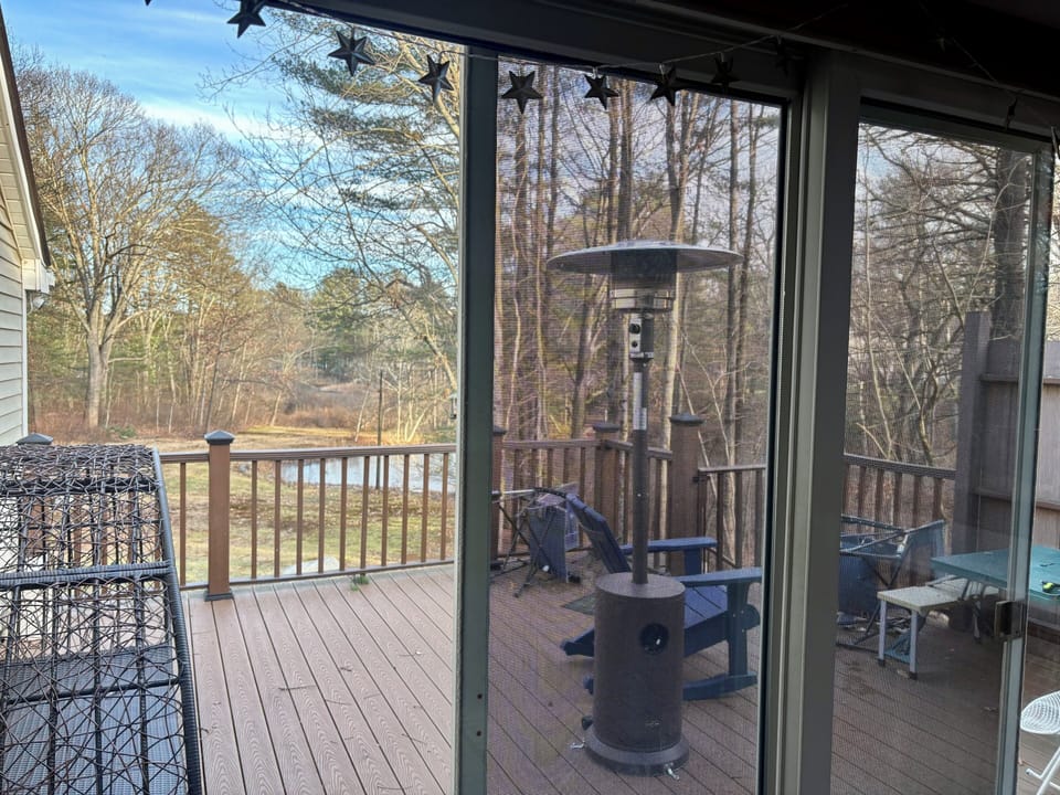 Private deck of upper level. yes, that's a pond!