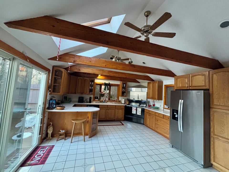 large refrigerator /breakfast counter