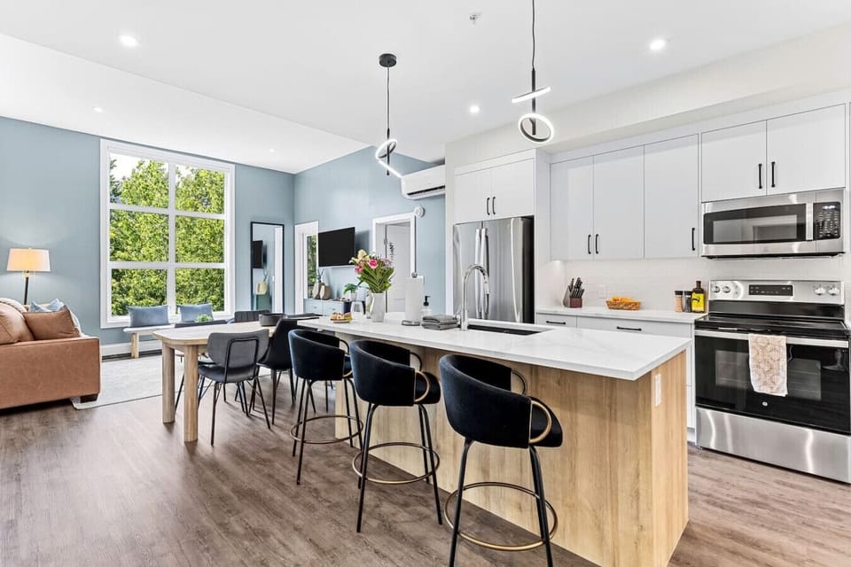 The heart of the home - the kitchen is filled of natural light, perfect for family gatherings.