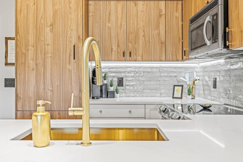 Gold accents tie the kitchen together beautifully.