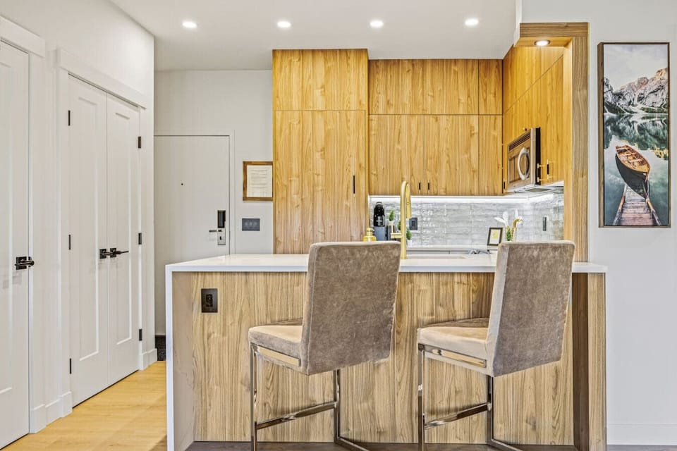 Kitchen island has seating for 2.