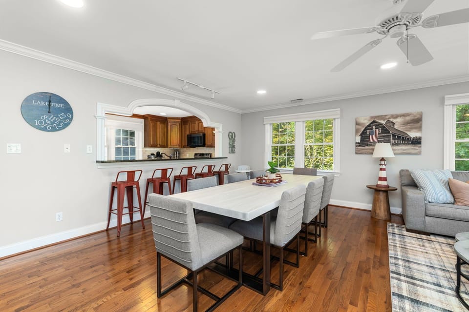 Gather around a sleek table for meals and laughter, bathed in natural light!