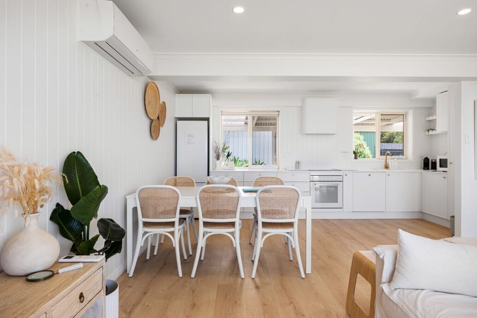 Gather around the dining table to share meals, conversation and slow evenings after a day exploring the coast.