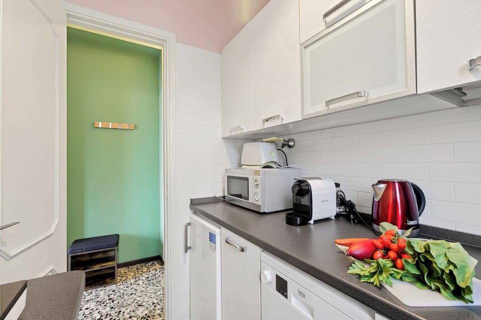 Honeymoon Apartment, Multiple Bedrooms, Mountainside (La Caravella Stresa Lake View) | Private kitchen | Fridge, microwave, stovetop, dishwasher
