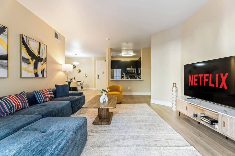Comfortable living room with a cozy seating area, modern design, and plenty of natural light. A great place to relax after a day in Los Angeles.