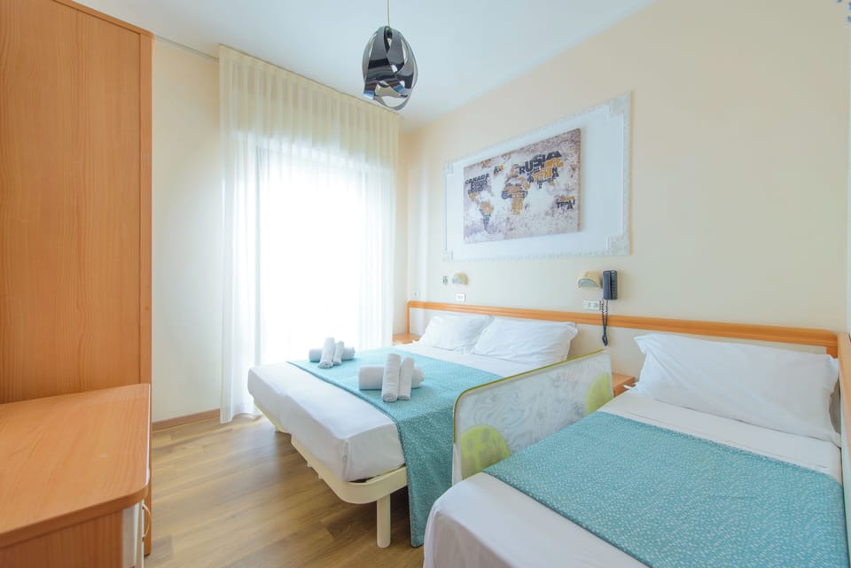 Standard Triple Room, Balcony | In-room safe, desk, laptop workspace, free WiFi